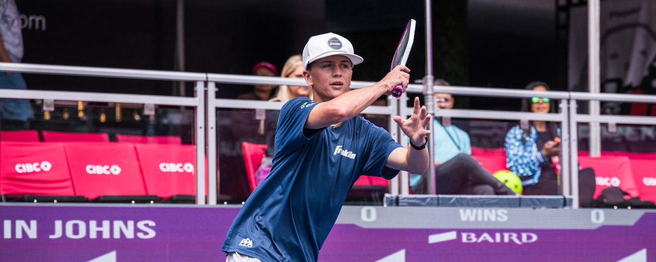 Hayden Patriquin hits a pickleball forehand.