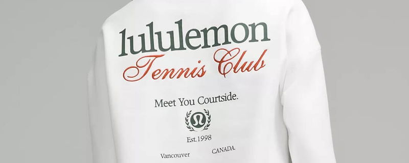 White lululemon sweatshirt with "tennis club" on the back