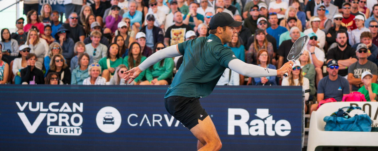 Ben Johns hits a backhand volley.