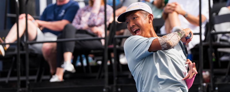 Quang Duong hitting a return.