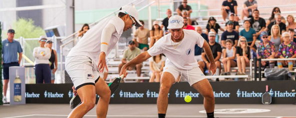 JW Johnson and Augie Ge playing pickleball men's doubles.