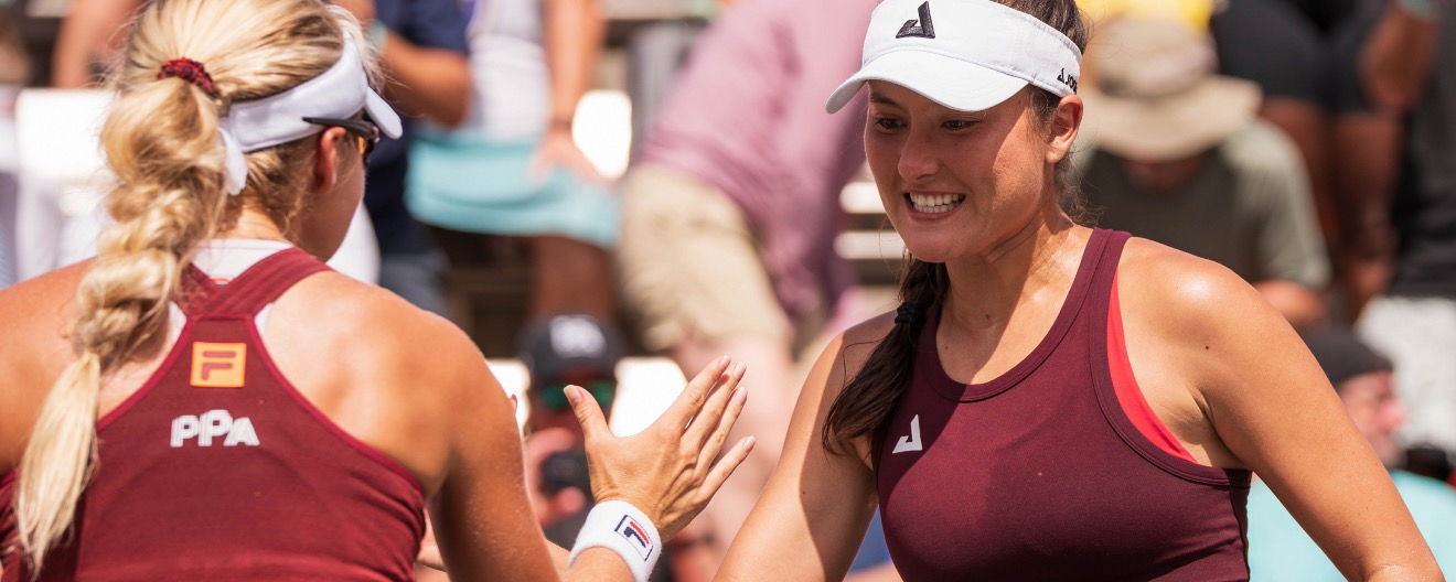 Anna Leigh Waters and Anna Bright celebrate a victory.