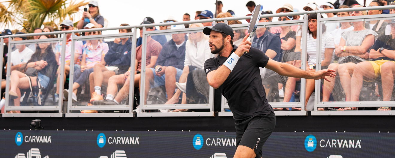 Dekel Bar hitting a pickleball forehand.