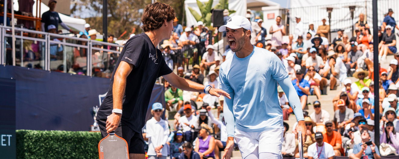 Ben Johns and Gabe Tardio celebrate a point during the men's doubles final at the Select Medical Orange County Cup presented by Reign Storm.