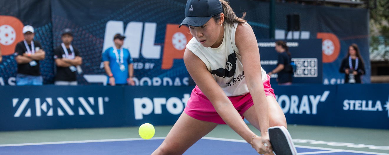Zoey Wang hitting a return.