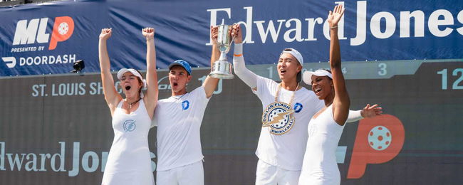 The Dallas Flash celebrating their title at the Edward Jones MLP Mid-Season Tournament.