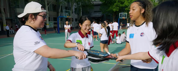 American and Chinese students coming together on the pickleball court.