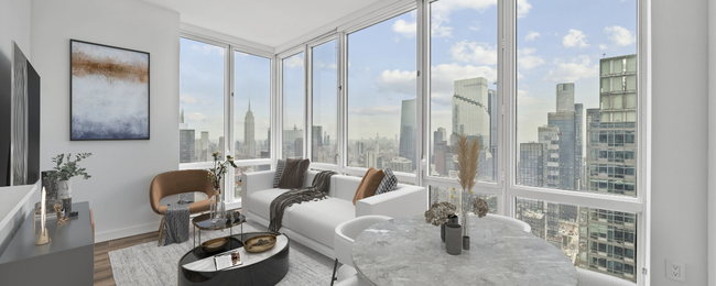 Riley Newman's apartment boasts amazing views.