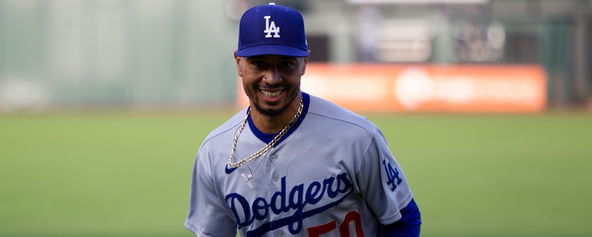 Mookie Betts smiling on the baseball field.