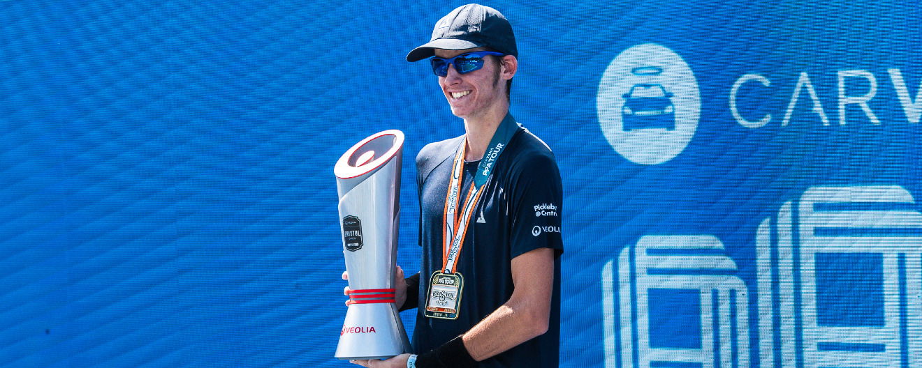 John Lucian Goins celebrating his men's singles title at the Veolia Bristol Open.