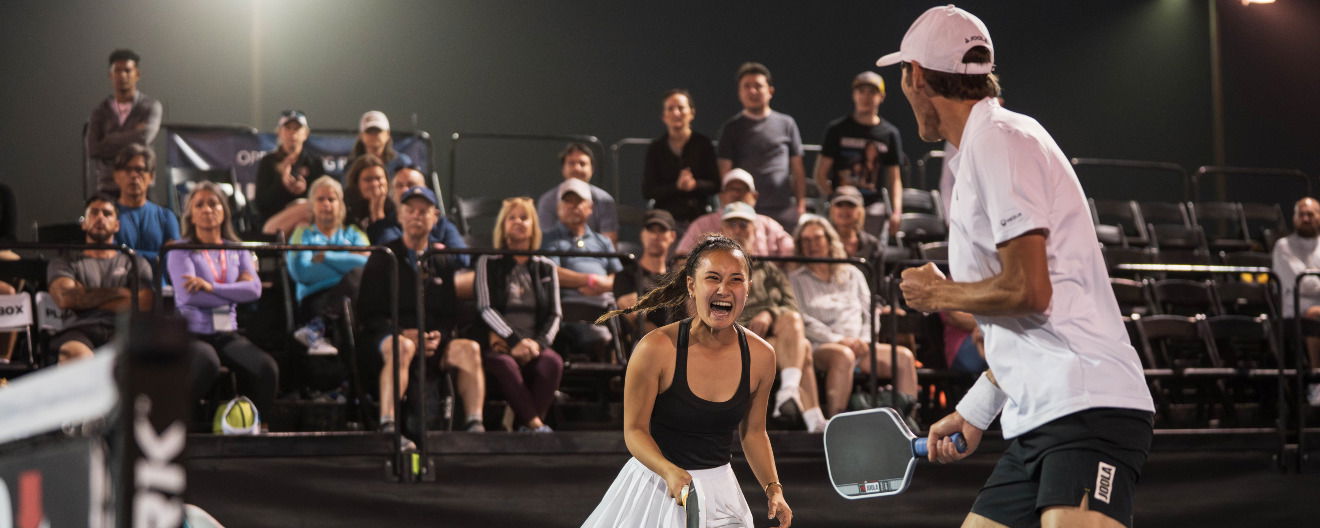 Alix Truong and Eric Oncins celebrating a point at the PPA Texas Open.