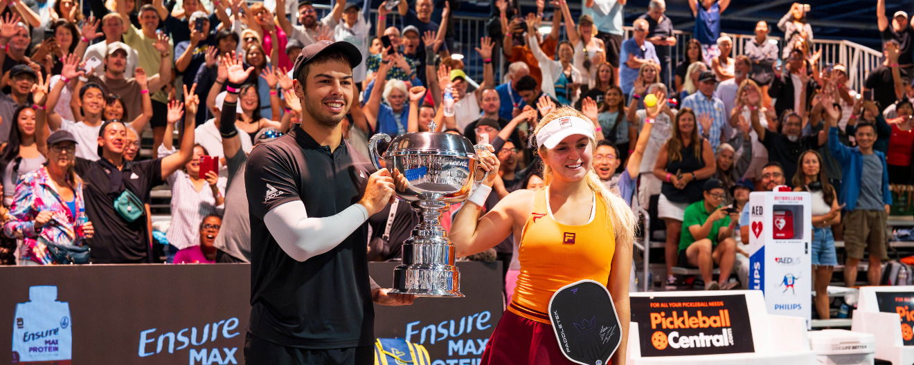 Ben Johns and Anna Leigh Waters with their mixed doubles trophy at the Walgreens Open at the Las Vegas Strip.