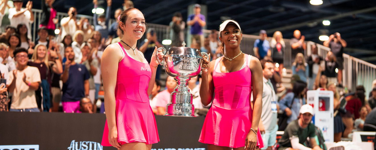 Jorja Johnson and Tyra Black with their women's doubles trophy at the Walgreens Open at the Las Vegas Strip.