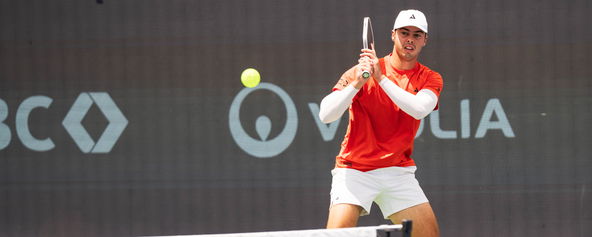 Ben Johns hitting a pickleball backhand.