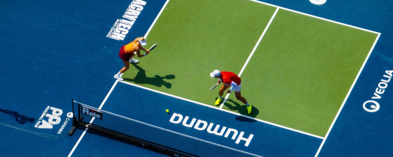 Anna Leigh Waters and Ben Johns playing pickleball