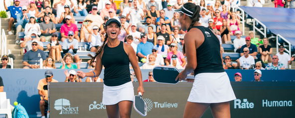 Jade Kawamoto (left) and Jackie Kawamoto (left) celebrate their victory at the Veolia Cincinnati Showcase presented by Six Zero.