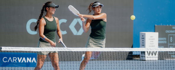 The Kawamoto sisters competing on the court in Cincinnati.