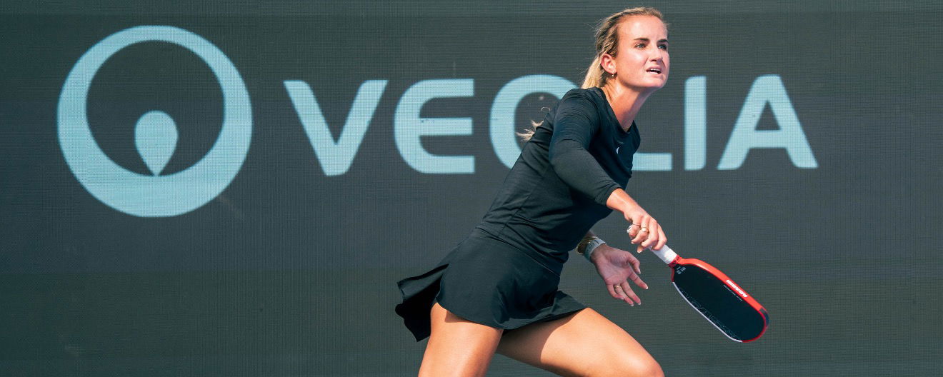 Kate Fahey competing on the court.