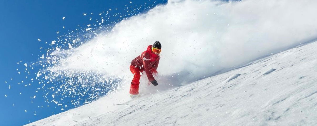 Faye Gulini snowboarding