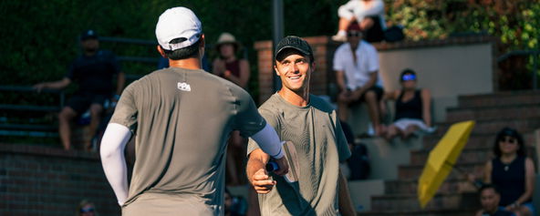 James Ignatowich and Augie Ge celebrate a point at the Pickleball Central Sacramento Vintage Open in Sacramento, CA.