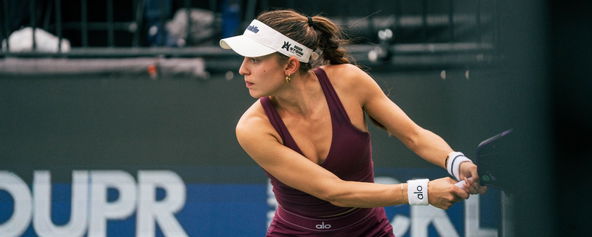 Parris Todd in a dark red outfit