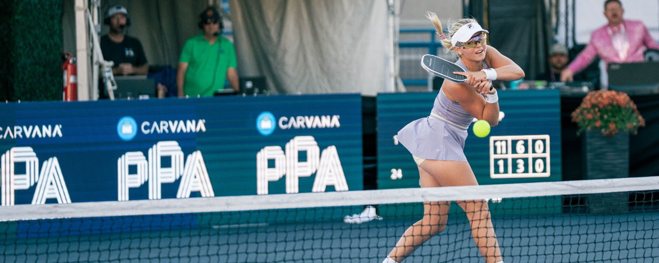 Anna Leigh Waters smashes a backhand back crosscourt