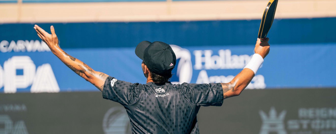 Jaume Martinez Vich throwing his arms in the air while playing pro pickleball.