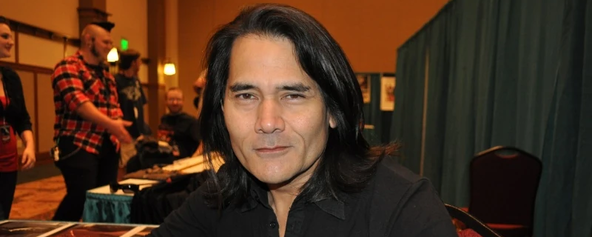 J. LaRose appearing at a fan event.