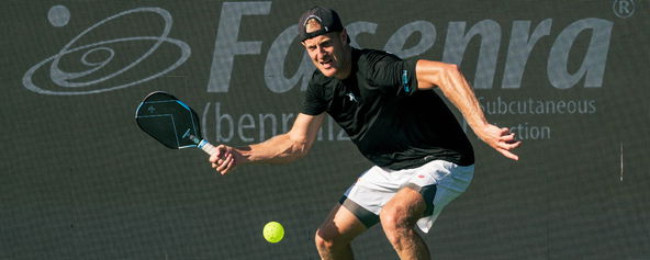 Riley Newman competing in pickleball mixed doubles.