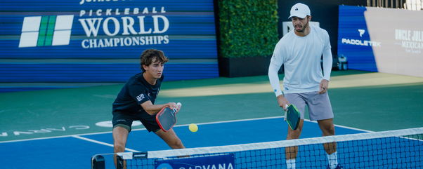 Gabe Tardio (L) and Ben Johns (R) competing in men's doubles at the Jenius Bank Pickleball World Championships.
