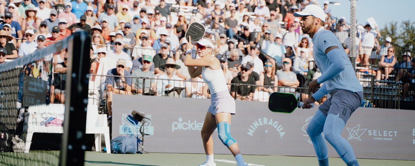 Anna Leigh Waters and Ben Johns on the court.