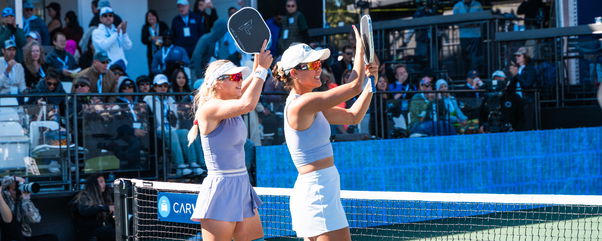 Anna Leigh Waters and Anna Bright celebrating their women's doubles title at the Jenius Bank Pickleball World Championships.