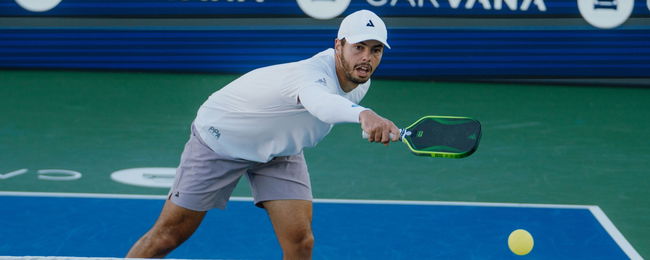 Johns playing pickleball using the Razer x JOOLA paddle.