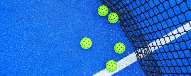 Pickleballs and a net.