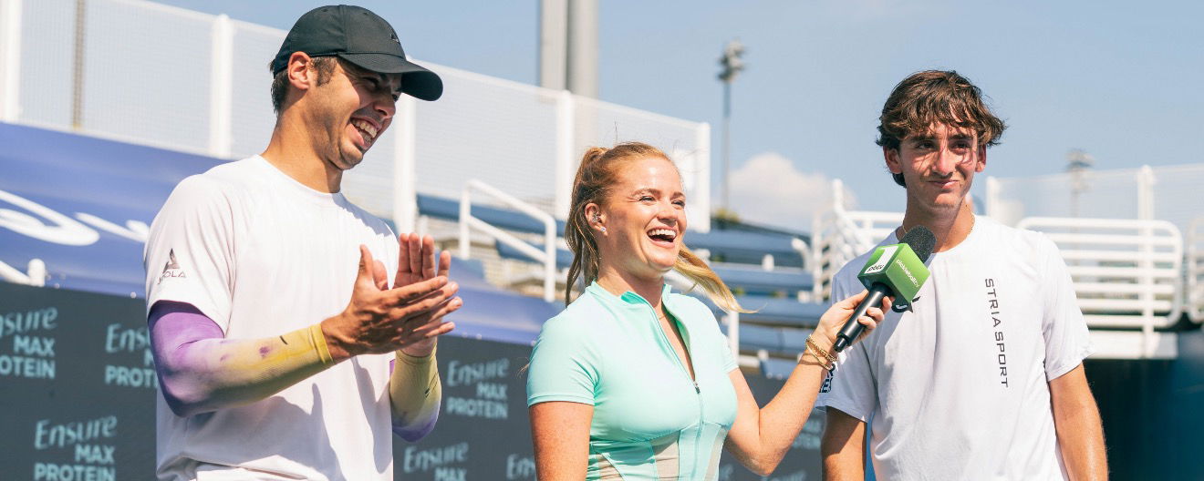 Michelle McMahon interviewing Ben Johns and Gabe Tardio during a tournament.