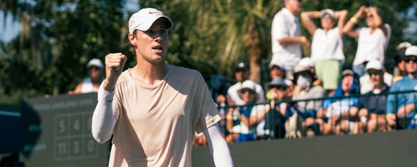 Roscoe Bellamy fist pumping on the pro pickleball court.