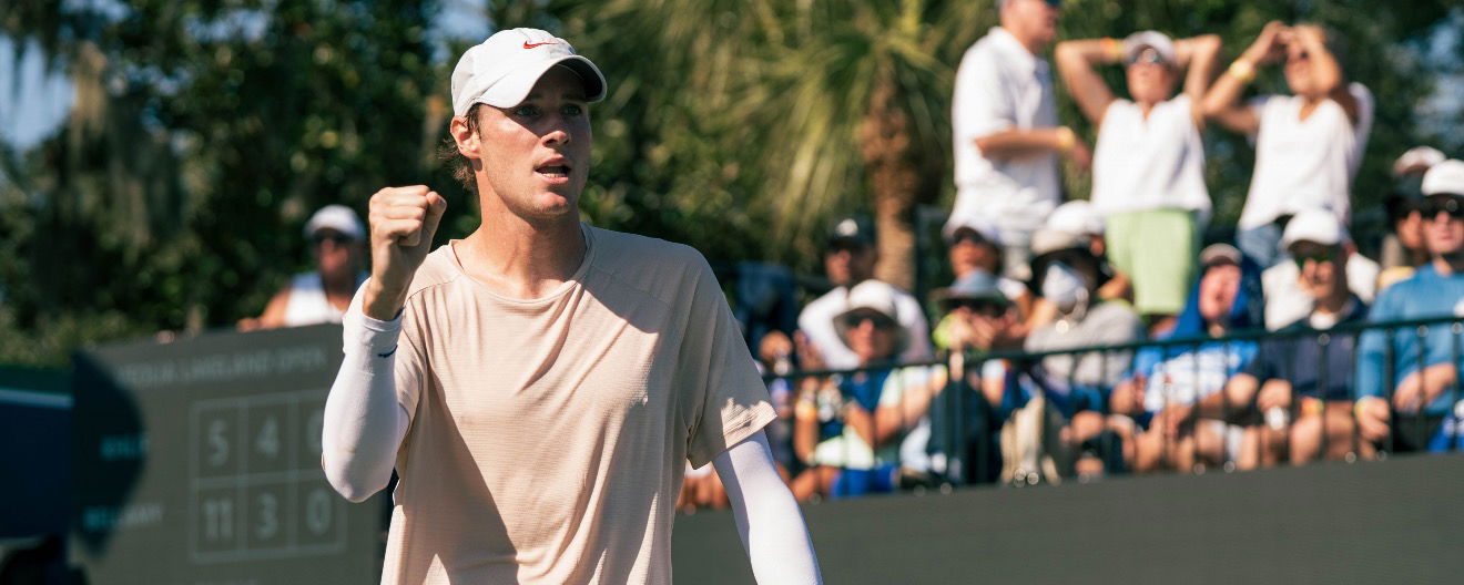 Roscoe Bellamy fist pumping on the pro pickleball court.