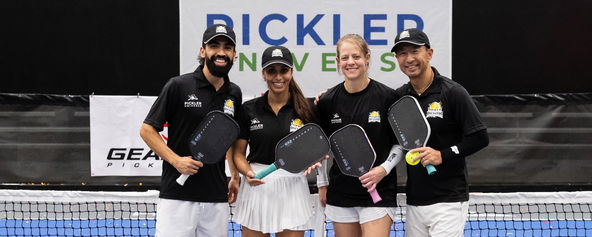 Chong "CK" Kim, Geneva Olson, Cristobal Del Castillo, and Abla Mannarino celebrating on the court.