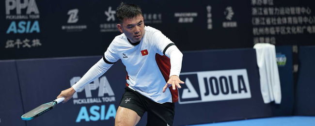 Hoang Nam Ly competing in men's singles at the Hangzhou Open.