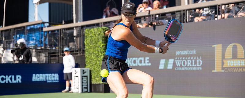 Kaitlyn Christian preparing to hit a return.