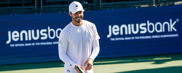 Ben Johns smiling on the court.
