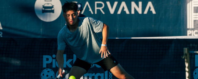 Luc Pham hits a pickleball forehand.
