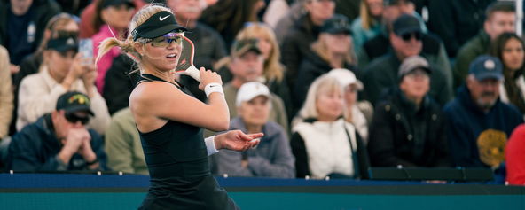 Anna Leigh Waters hitting a return on the court.