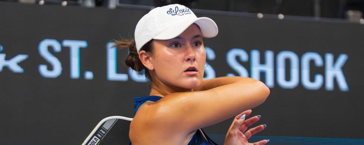 Anna Bright wearing a St. Louis Shock hat and playing pickleball.