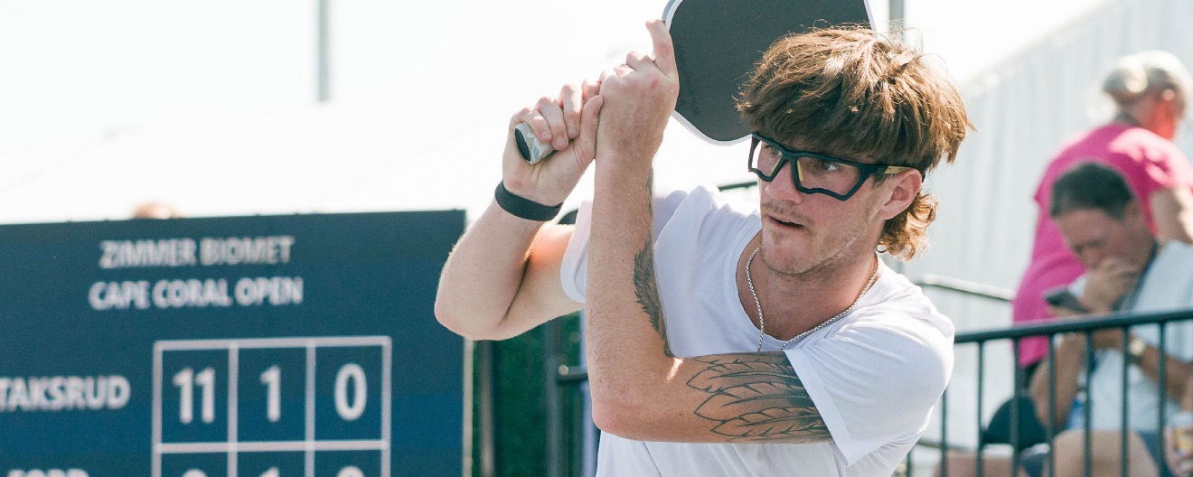 Zane Ford playing pro pickleball and wearing lens-free eye glasses.