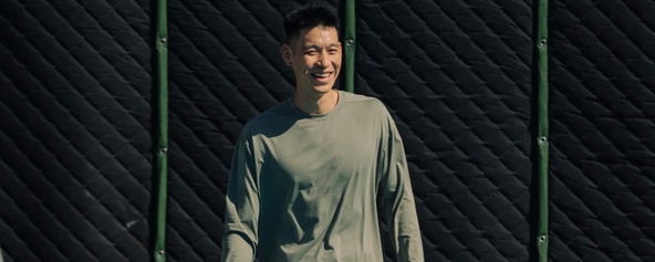Jeremy Lin smiling on the pickleball court.