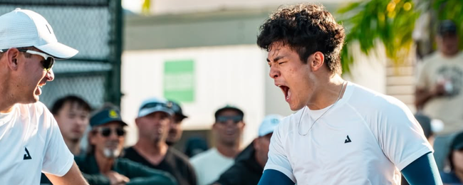 Collin Johns and Len Yang celebrate their victory on Friday.