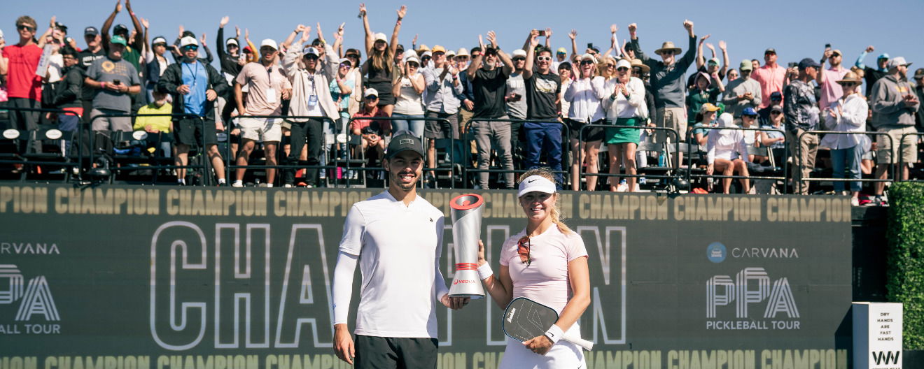 Anna Leigh Waters and Ben Johns celebrating their mixed doubles title at the Veolia Texas Open presented by Proton in Mckinney, TX.