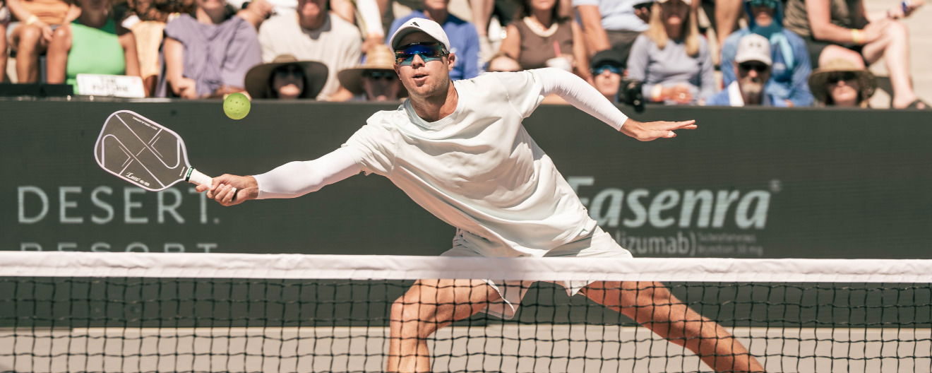 Chris Haworth hitting a forehand volley.