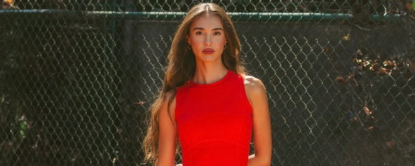 Cleo Bond in a red dress.
